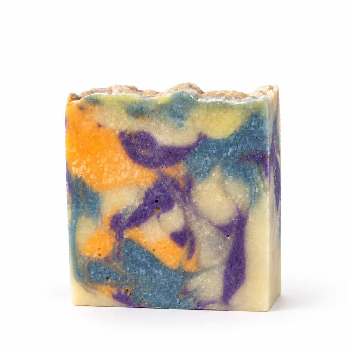 Monkey Farts handmade soap bar with orange purple and blue swirls on white